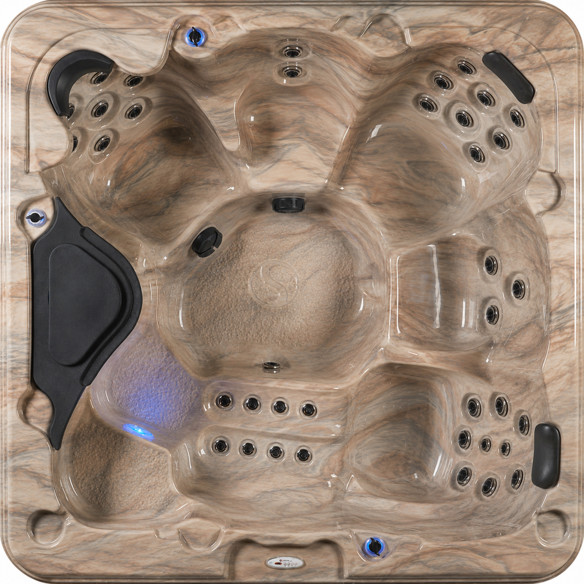Hot tub with tan marbled interior acrylic surface and multiple jets