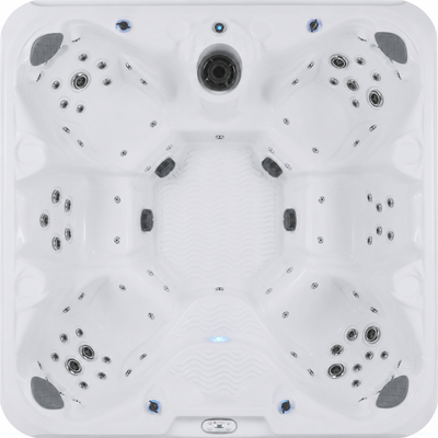 Top-down view of a white six-seat outdoor hot tub with multiple jet nozzles and blue LED lighting accents 