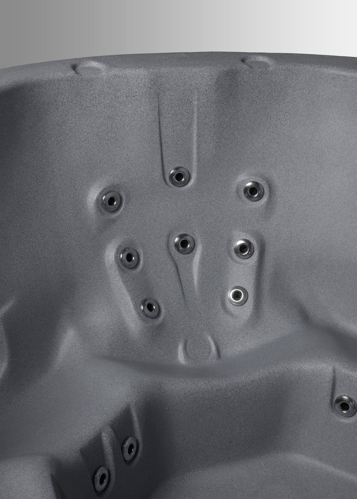 Close-up of a gray hot tub with multiple jets. #color_gray