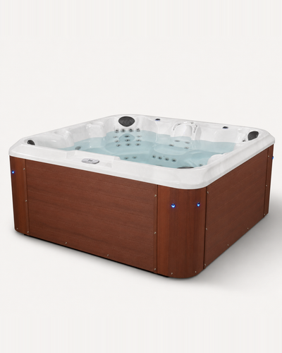 A square hot tub with a brown wood-grain exterior and a white interior rim, filled with light blue water, shown on a plain light background.