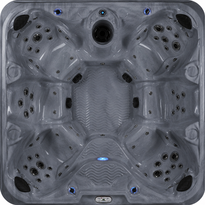 Gray hot tub with multiple jets and a central light 