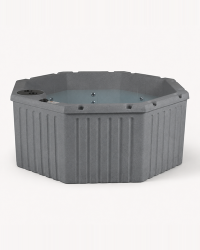 A gray octagonal outdoor hot tub with a ribbed exterior and a light blue-tinted water pool, shown from a front-three-quarter angle on a clean white background. #color_gray