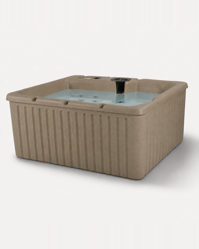 A hot tub with a ribbed exterior and a light blue water fill opening, shown on a plain light gray background