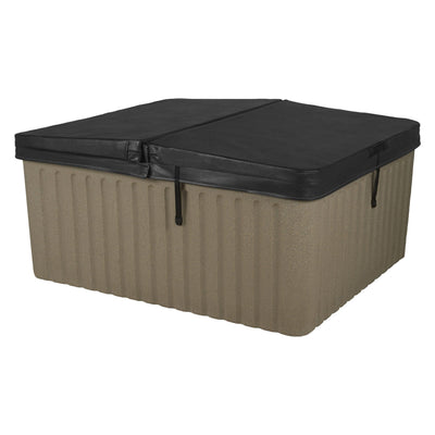 tan rectangular hot tub with black cover 