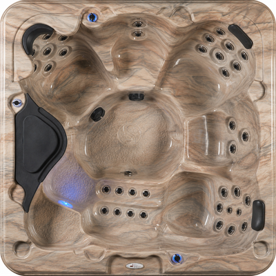 Hot tub with tan marbled interior acrylic surface and multiple jets