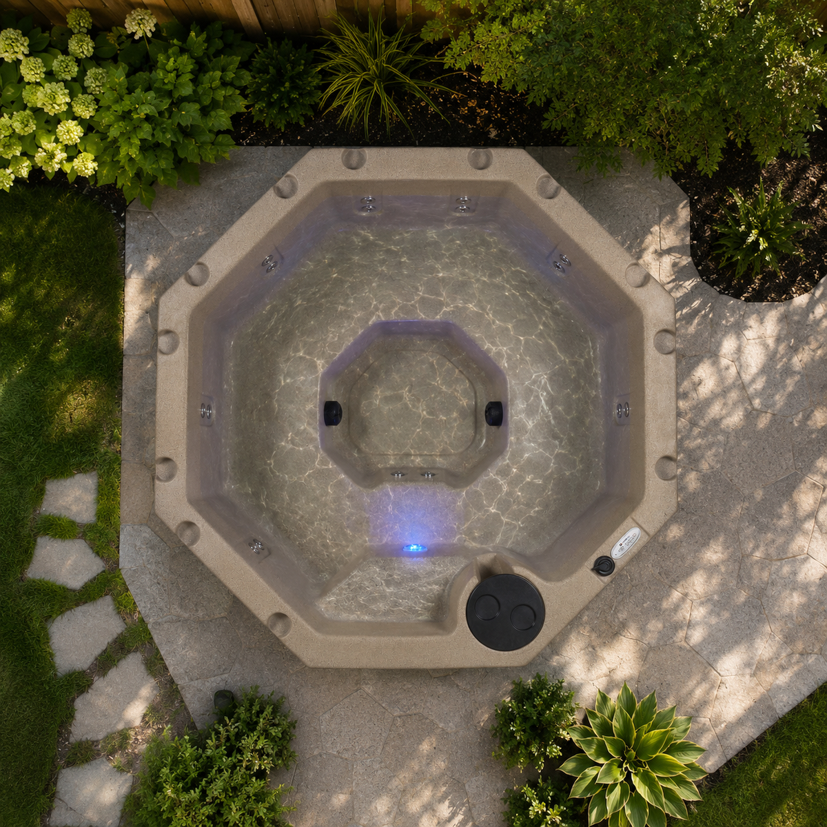 Octagonal hot tub in a garden setting with plants and a stone path.